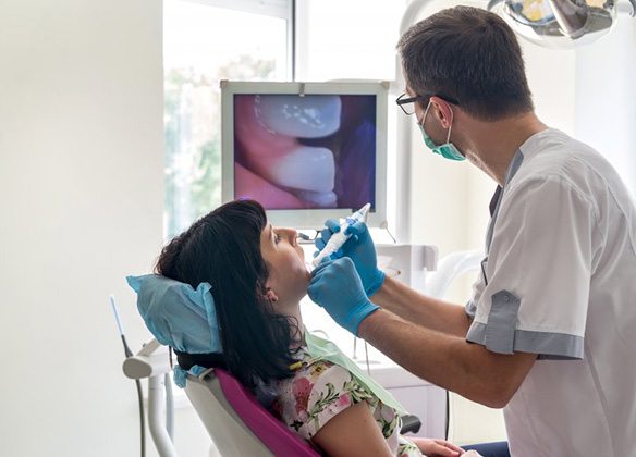 Patient in Manasquan receiving dental exam 