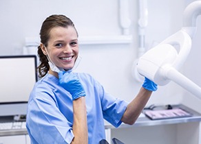 Lady smiles at dentist