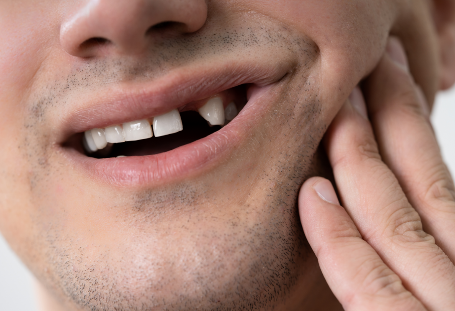 Close up of man missing tooth