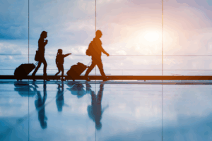 a family walking through an airport